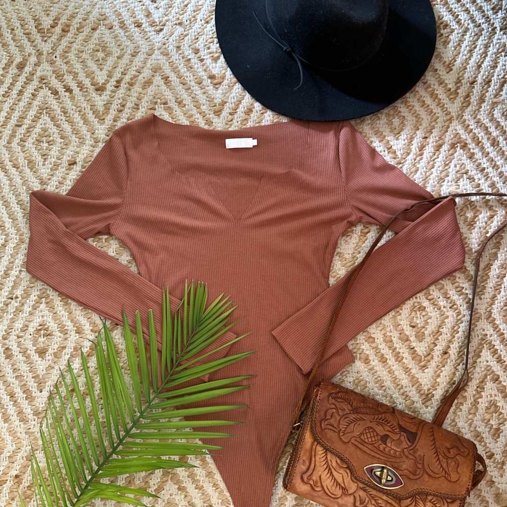 Meshki Clay colored bodysuit.